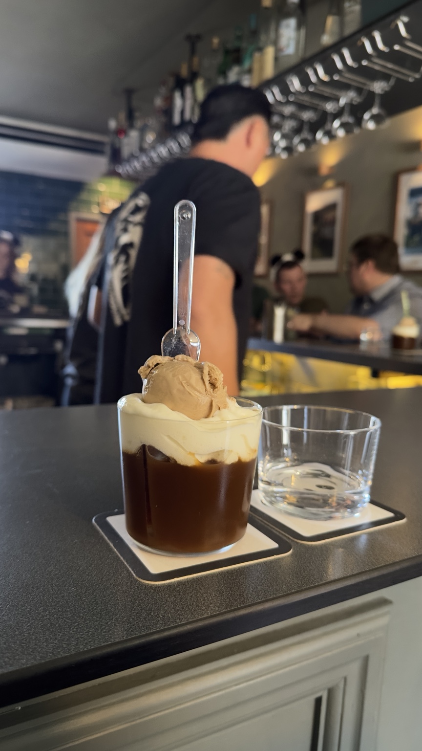 An espresso martini dessert drink at a bar